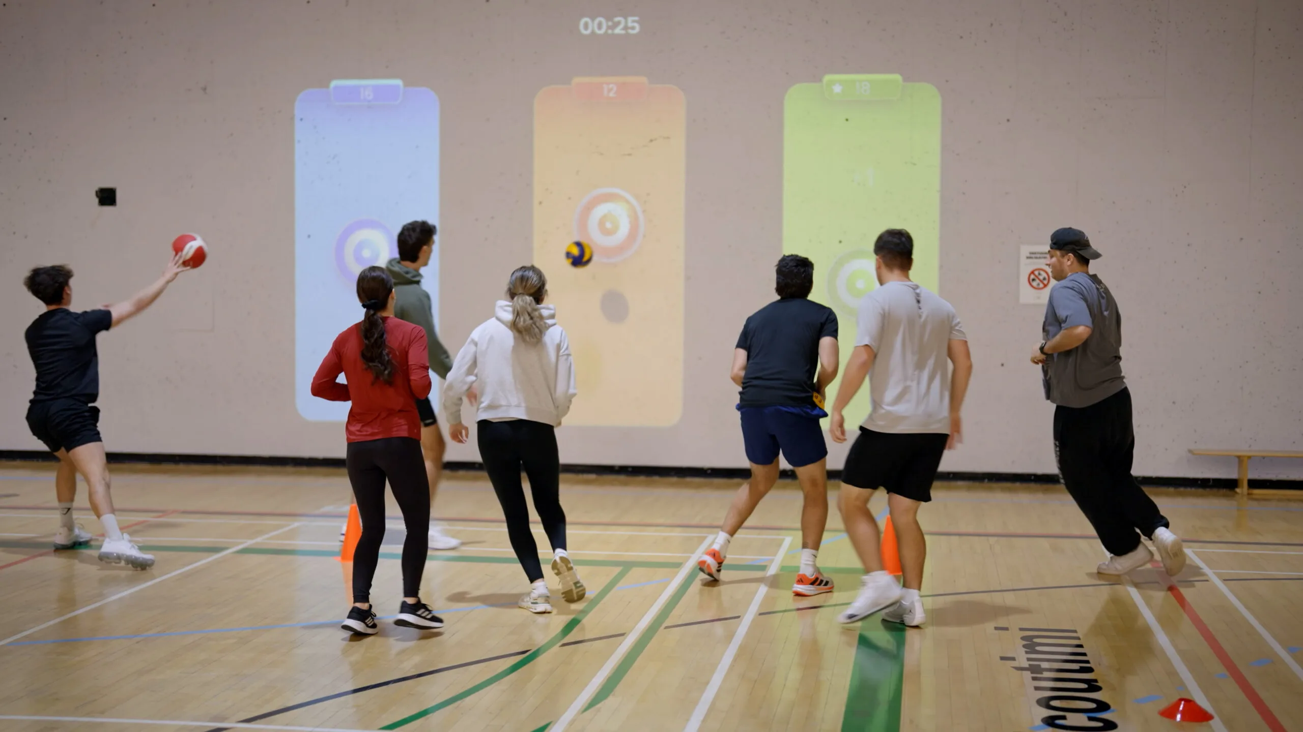 People moving and playing with a Lü interactive experience